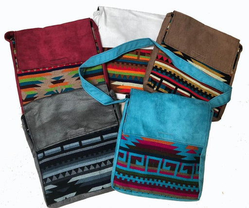 Woven panel messenger style bag with flap top. Shipped in assorted colors and patterns.