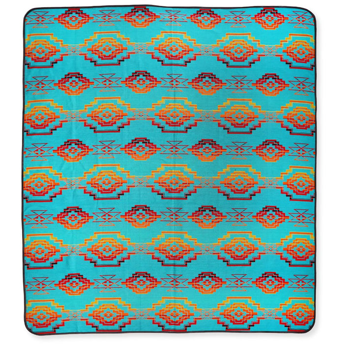 Southwest style bedspread in queen-size. Red, orange, yellow, and teal colors.