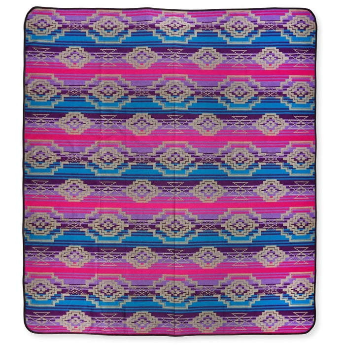 Southwest style bedspread in queen-size. Purple, pink, and blue colors.