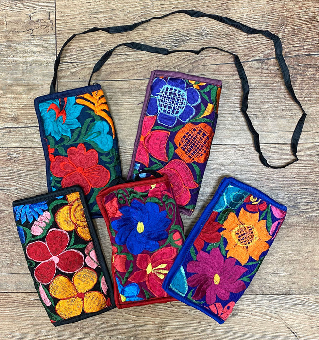 Embroidered pouch for glasses or smartphone. Has a side pocket and carrying strap, shipped in assorted colors and designs.