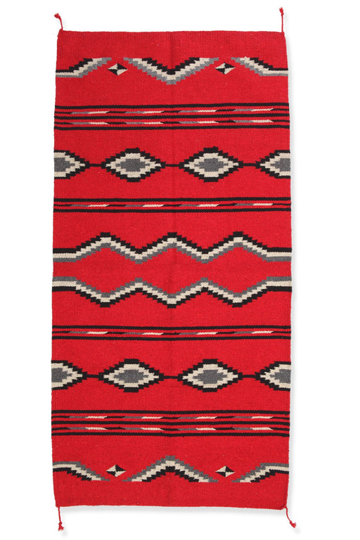 Wool southwest style rug in traditional red, black, white, grey colors.