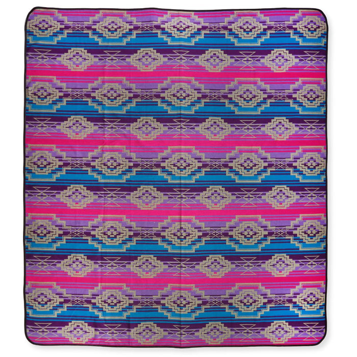 Southwest style bedspread in king-size. Purple, pink, blue colors.