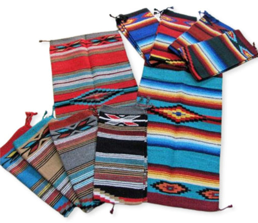 12 pack acrylic 20 inch by 40 inch fire and feather hawkeye rugs. Sipped in assorted colors.