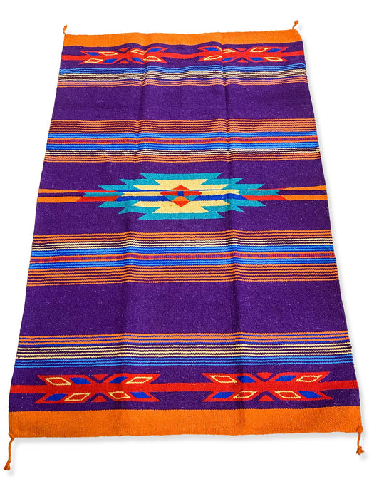 Handwoven Cantina Throw Rug 4' x 6' in purple, orange, and teal. Southwest design